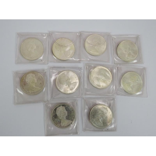 299 - Ten 1965 Canadian silver dollar coins. Gross weight 230 grams.
Condition report: All used.