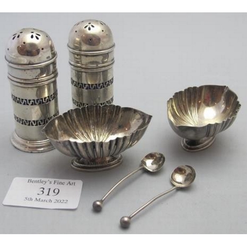 319 - A small pair of boat shaped pedestal salts, Birmingham 1891, and a pair of salt spoons, Birmingham 1... 