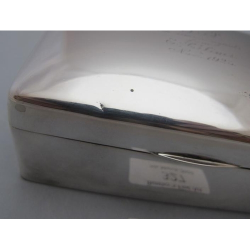 327 - A silver cigarette box with engraving to lid, Birmingham 1942, approx 5