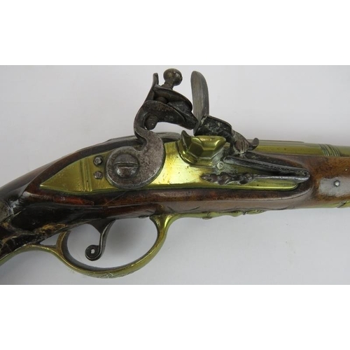 33 - An 18th century flintlock pistol with leopards head butt cap. Length 31cm.
Condition report: Histori... 