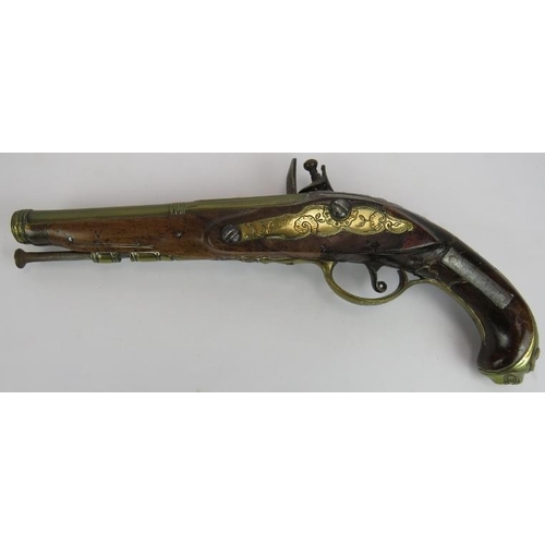 33 - An 18th century flintlock pistol with leopards head butt cap. Length 31cm.
Condition report: Histori... 