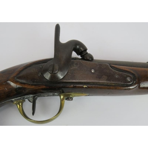 34 - An early 19th century French 1822 percussion service pistol with engraved lock and stamped stock. Le... 