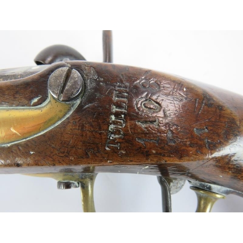 34 - An early 19th century French 1822 percussion service pistol with engraved lock and stamped stock. Le... 