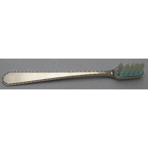 340 - A baby's silver handled toothbrush with spare brush, stamped sterling, boxed.
Condition report: Good... 