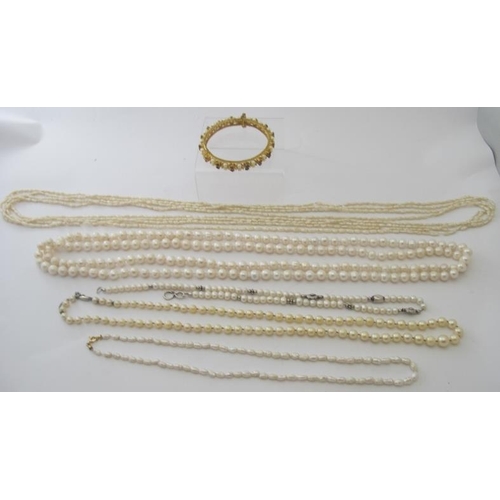 348 - A long string of individually knotted pearls, approx 30