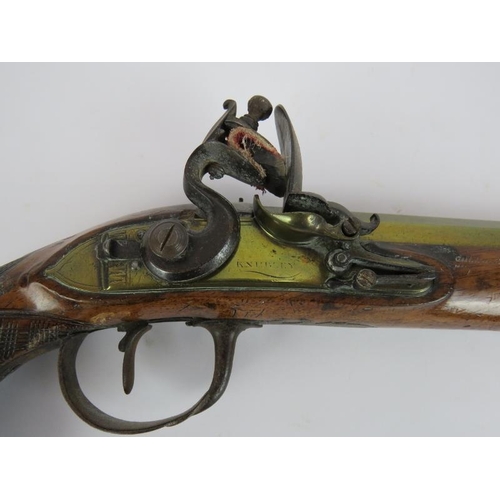 36 - An 18th century flintlock duelling pistol by Knubley of London. Octagonal brass barrel, diamond etch... 