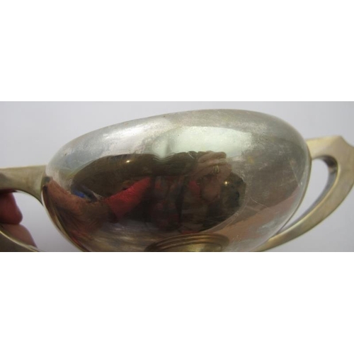 366 - A plain silver two handled trophy, Sheffield 1956. Approx weight 9.7 troy oz/303 grams.
Condition re... 