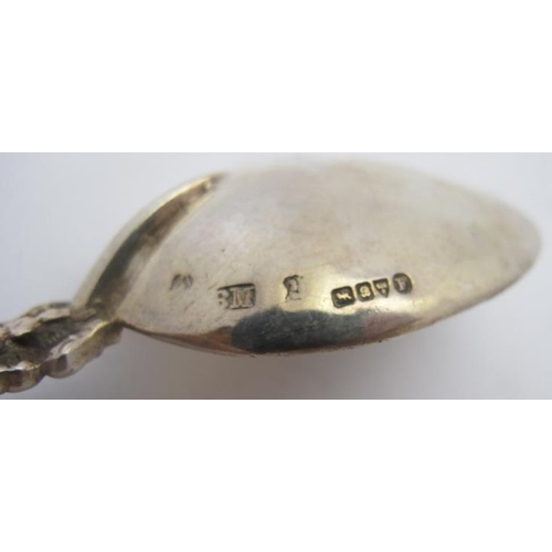 373 - A pair of ornate Dutch silver spoons with import marks for Chester 1902 & 1903. The bowls decorated ... 