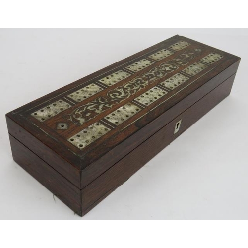 43 - A mother of pearl inlaid rosewood cribbage box with contents including pegs, playing cards & dice pl... 