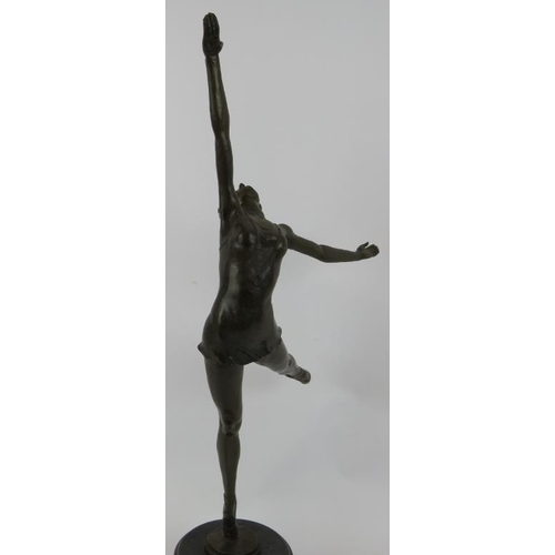 5 - A bronze figure of a ballet dancer in the Art Deco style, mounted on a black marble plinth, unsigned... 