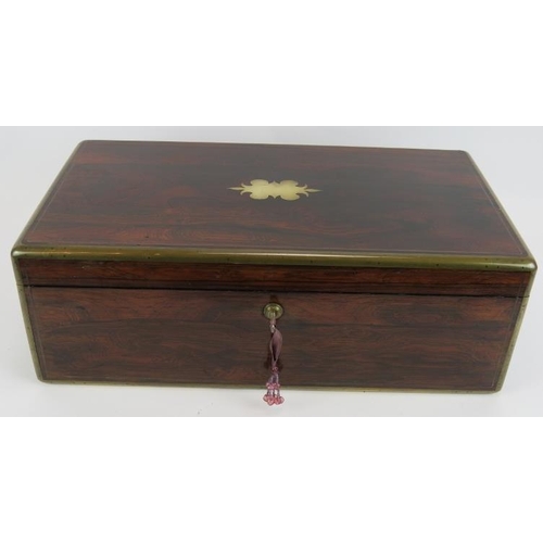 54 - A 19th Century brass bound rosewood writing slope with working Bramah lock, flush handles and docume... 