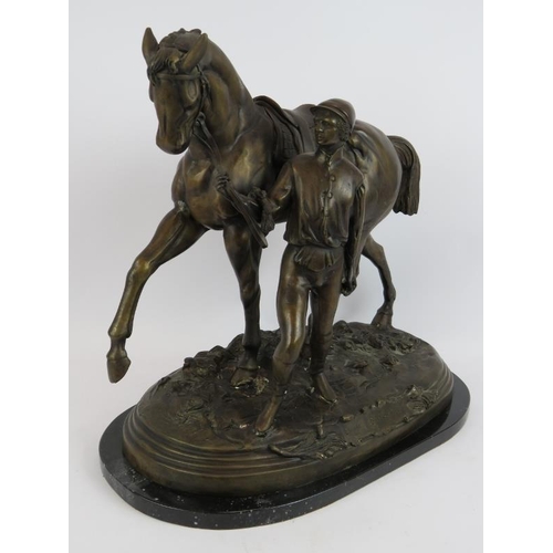 57 - A large contemporary bronze figure of horse and jockey mounted on a black marble base. Inscribed: Ed... 