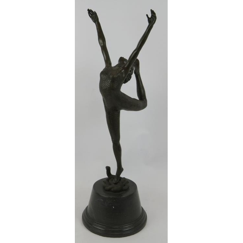 6 - A bronze figure of a snake dancer in the Art Deco style, mounted on a black marble plinth, unsigned.... 