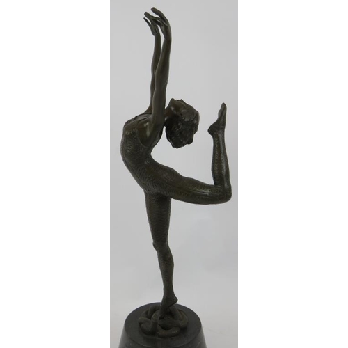 6 - A bronze figure of a snake dancer in the Art Deco style, mounted on a black marble plinth, unsigned.... 