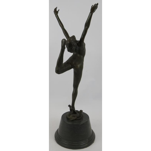 6 - A bronze figure of a snake dancer in the Art Deco style, mounted on a black marble plinth, unsigned.... 