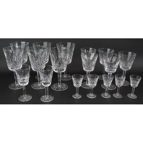 60 - A suite of 18 Waterford crystal Lismore pattern glasses comprising 6 large goblets, 5 small goblets,... 