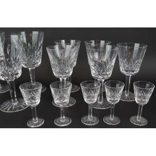 60 - A suite of 18 Waterford crystal Lismore pattern glasses comprising 6 large goblets, 5 small goblets,... 