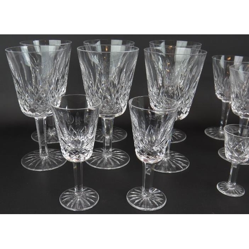 60 - A suite of 18 Waterford crystal Lismore pattern glasses comprising 6 large goblets, 5 small goblets,... 