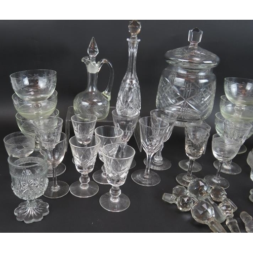 65 - A large quantity of antique and 20th century glassware including a biscuit barrel, dessert dishes, j... 