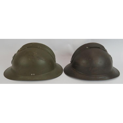 74 - Two WWI French Adrian Infantry helmets plus another WWII period helmet (3).
Condition report: Sold a... 