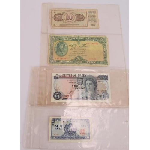 77 - A 1955 British white £5 note, three green £1 notes, 1970s £5 & £10 pound notes plus four other notes... 