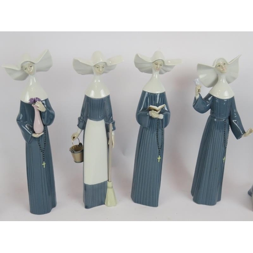 80 - Six Lladro Spanish porcelain figures of nuns in various poses, all with boxes plus two Nao figures. ... 