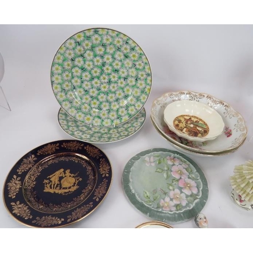 83 - A mixed lot of ceramics including a Dresden figure, Chinese porcelain plates, Majolica tea pot, etc,... 