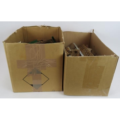 86 - A large quantity of vintage Meccano parts contained in two large boxes, (qty).
Condition report: Sol... 