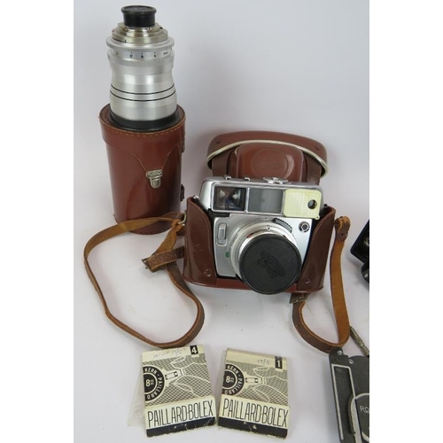 87 - A Vintage Baldamatic III camera & case with 135mm lens plus various Rolleiflex filters and accessori... 