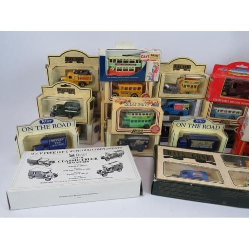 93 - A collection of boxed model cars & buses, mainly Days Gone By Lledo, plus three boxed sets (qty).
Co... 