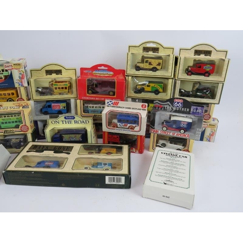 93 - A collection of boxed model cars & buses, mainly Days Gone By Lledo, plus three boxed sets (qty).
Co... 