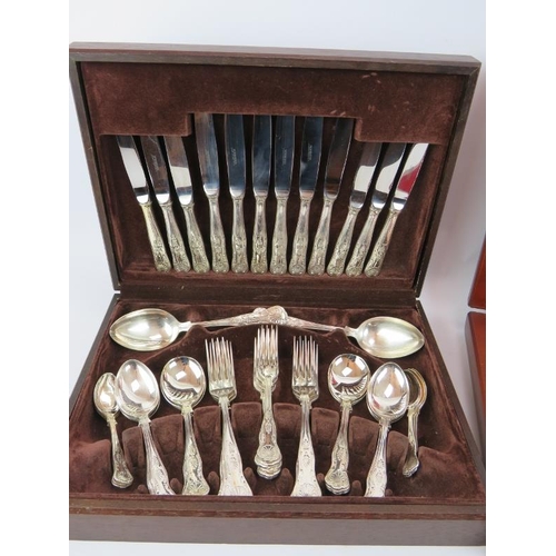 94 - Two canteens of silver plated King's pattern cutlery both in fitted wooden cases. Both sets complete... 