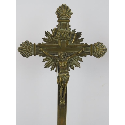 95 - An antique brass crucifix on stand. Height 45cm.
Condition report: Age related wear.