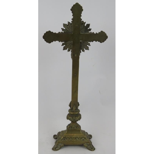 95 - An antique brass crucifix on stand. Height 45cm.
Condition report: Age related wear.