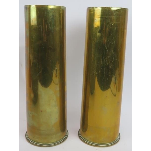 96 - A pair of WWI brass shell cases, a brass water carrier, copper kettle and a heavy gauge copper pan (... 