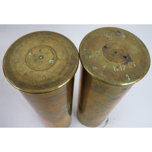 96 - A pair of WWI brass shell cases, a brass water carrier, copper kettle and a heavy gauge copper pan (... 