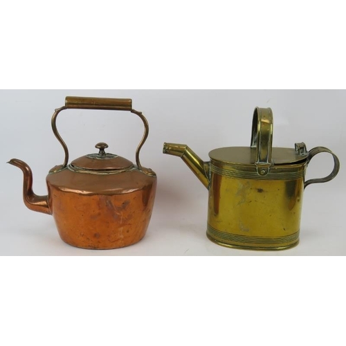 96 - A pair of WWI brass shell cases, a brass water carrier, copper kettle and a heavy gauge copper pan (... 