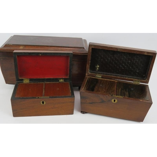 97 - A 19th century rosewood tea caddy with boxwood stringing, a small rosewood sarcophagus tea caddy and... 