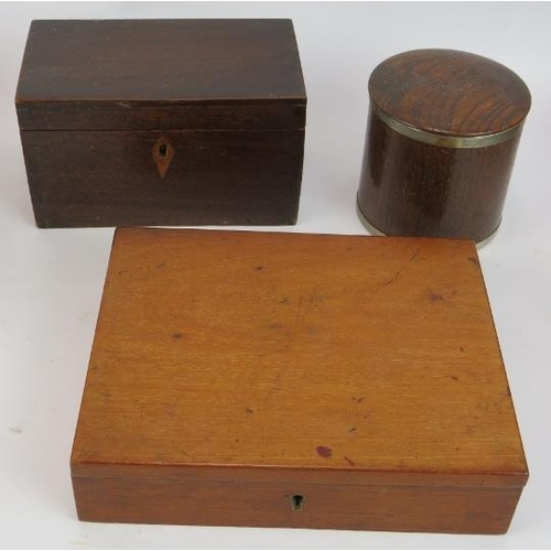 98 - Eight mixed wooden boxes including an inlaid desk inkstand, a small tea caddy and a metal bound mone... 