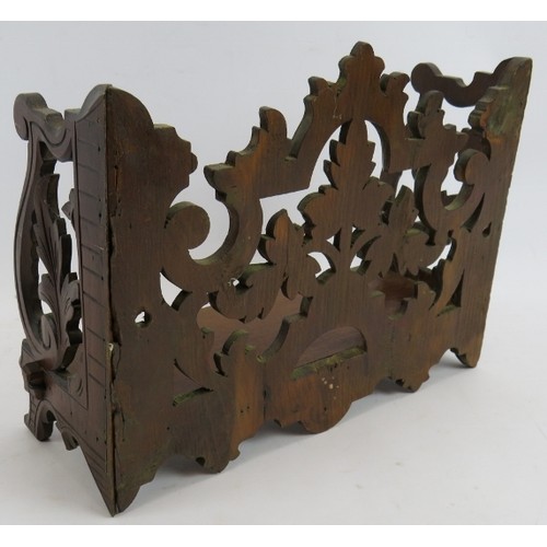 163 - A small Black Forest style carved wood wall shelf. 32cm wide, 24cm high.
Condition report: No issues... 