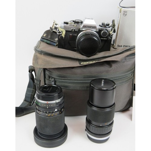 269 - A Pentax ME Super camera with 50mm, 75-150mm and 28-80mm lenses, an Olympus OM10 camera with 50mm, 7... 