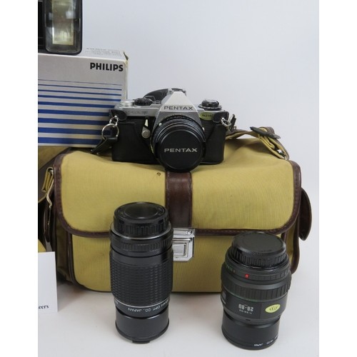 269 - A Pentax ME Super camera with 50mm, 75-150mm and 28-80mm lenses, an Olympus OM10 camera with 50mm, 7... 