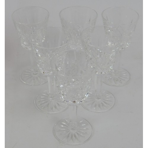 270 - A suite of 12 Waterford crystal glasses in Lismore pattern. Six Sherry/Port glasses 13cm tall and si... 