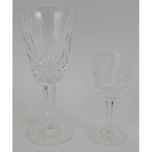 270 - A suite of 12 Waterford crystal glasses in Lismore pattern. Six Sherry/Port glasses 13cm tall and si... 