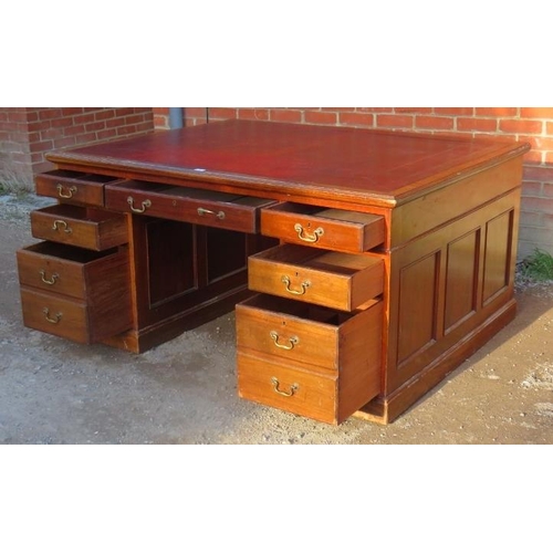 701 - A substantial Victorian mahogany twin pedestal partners desk, with inset gilt tooled burgundy leathe... 