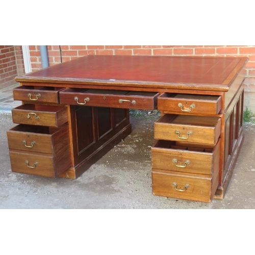 701 - A substantial Victorian mahogany twin pedestal partners desk, with inset gilt tooled burgundy leathe... 