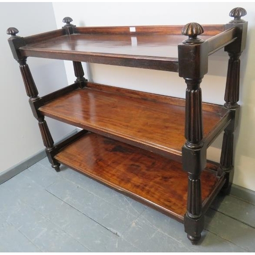 734 - A Victorian mahogany three tier buffet, with fluted uprights, on tapering bun feet.
Condition report... 