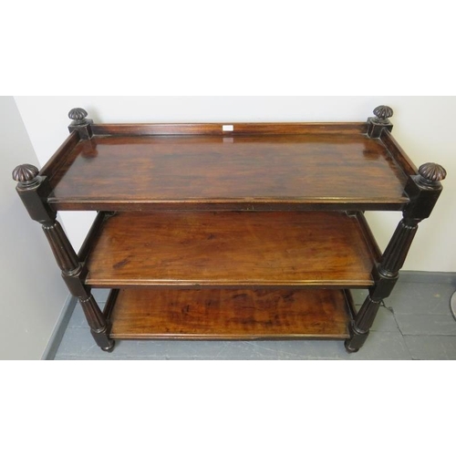 734 - A Victorian mahogany three tier buffet, with fluted uprights, on tapering bun feet.
Condition report... 