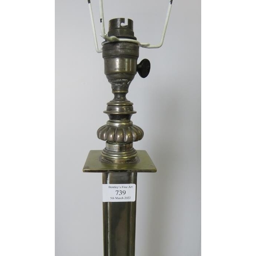 739 - An Edwardian heavy brass standard lamp, with a square column, on a plinth base in the Neo-Classical ... 