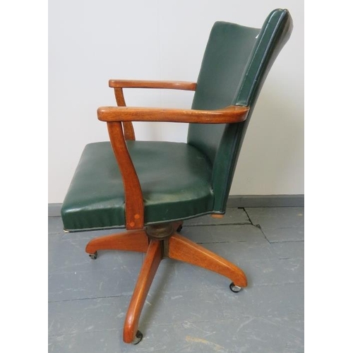 746 - A vintage medium oak ‘Hillcrest’ desk chair, with tilt and swivel mechanism, on castors. 
Condition ... 